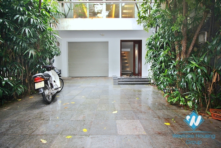 Semi-furnished 4 bedrooms house with big yard for rent in Tay Ho ward, Ha Noi
